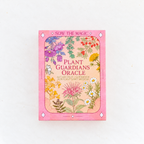 Plant Guardians Oracle card deck box by Sow the Magic, featuring a pink border and a central illustration of various colorful wildflowers and botanicals on a white background.