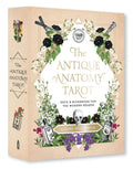 The Antique Anatomy Tarot packaging with floral and anatomical design elements.
