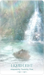 Person submerged in water with a soft, blurred background and text 'Liquid Light' at the bottom.