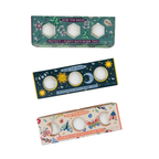 Three boxes of bath bomb sets with colorful designs on a white background