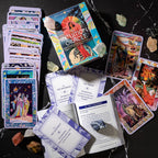 Inuition Oracle cards on a dark surface with crystals around