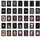 A 4x8 grid of illustrated tarot-style cards shown against a plain white background. The cards feature dark, mystical artwork in black, red, and cream tones, including abstract symbols, celestial motifs, and gothic scenes.