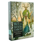 Box for 'The Wild Wood Tarot' with a figure holding a drum in a forest setting.