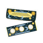 Abundance bath bomb trio packaging with celestial design on a white background