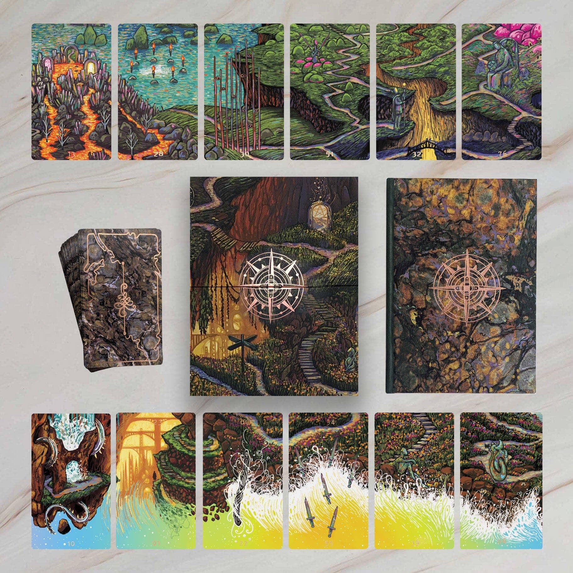 Collection of tarot cards with various landscapes and symbols on a white background