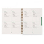 Open gardening planner with a table of contents on a white background