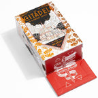 Fantasy oracle card game box with intricate design on a white background