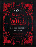 Front cover of the 'Seasons of the Witch: Samhain Oracle' Deluxe Edition card deck, featuring a black background with intricate red occult and seasonal illustrations, including a crescent moon, stars, and stylized moths, with white text.