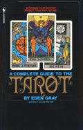 Book cover of 'A Complete Guide to the Tarot' by Eden Gray with tarot card illustrations on a black background.
