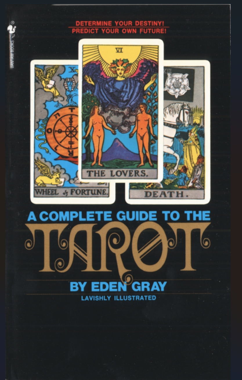 Book cover of 'A Complete Guide to the Tarot' by Eden Gray with tarot card illustrations on a black background.