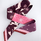 Floral and abstract patterned fabric on a white background