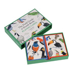 Playing cards with bird illustrations in a green box on a white background