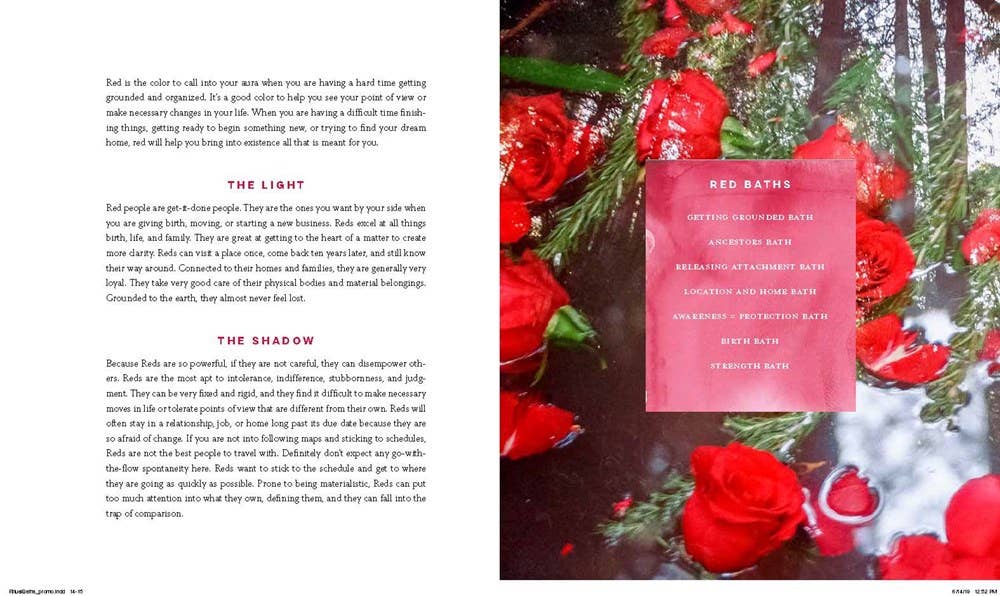 Magazine page with red roses, text, and a pink card on a dark background