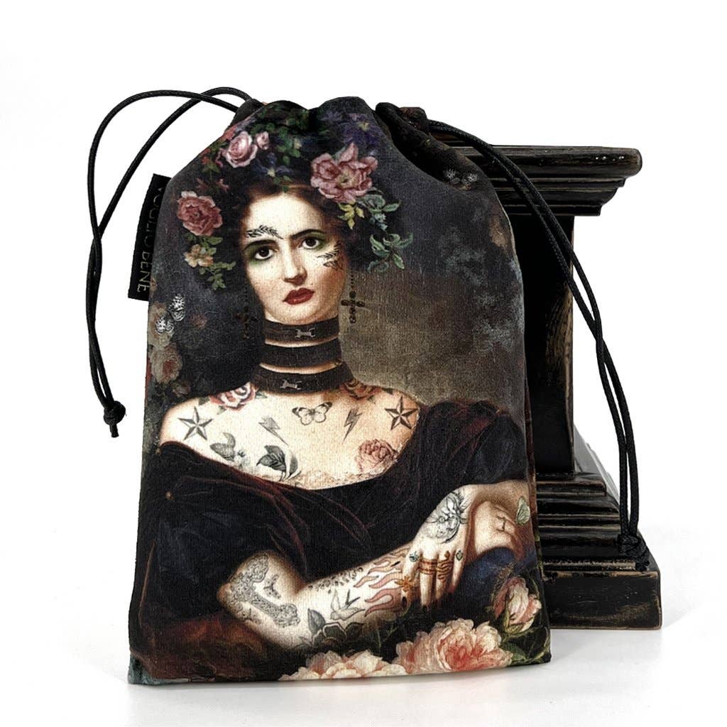 Drawstring bag with a design of a woman with tattoos and flowers on a white background