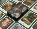 Garden of Chocolates box surrounded by illustrated cards on a green surface