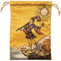 Gold drawstring pouch with a tarot card-style illustration of a figure holding a sun above their head.