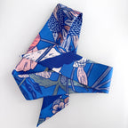 Blue floral patterned fabric on a white background