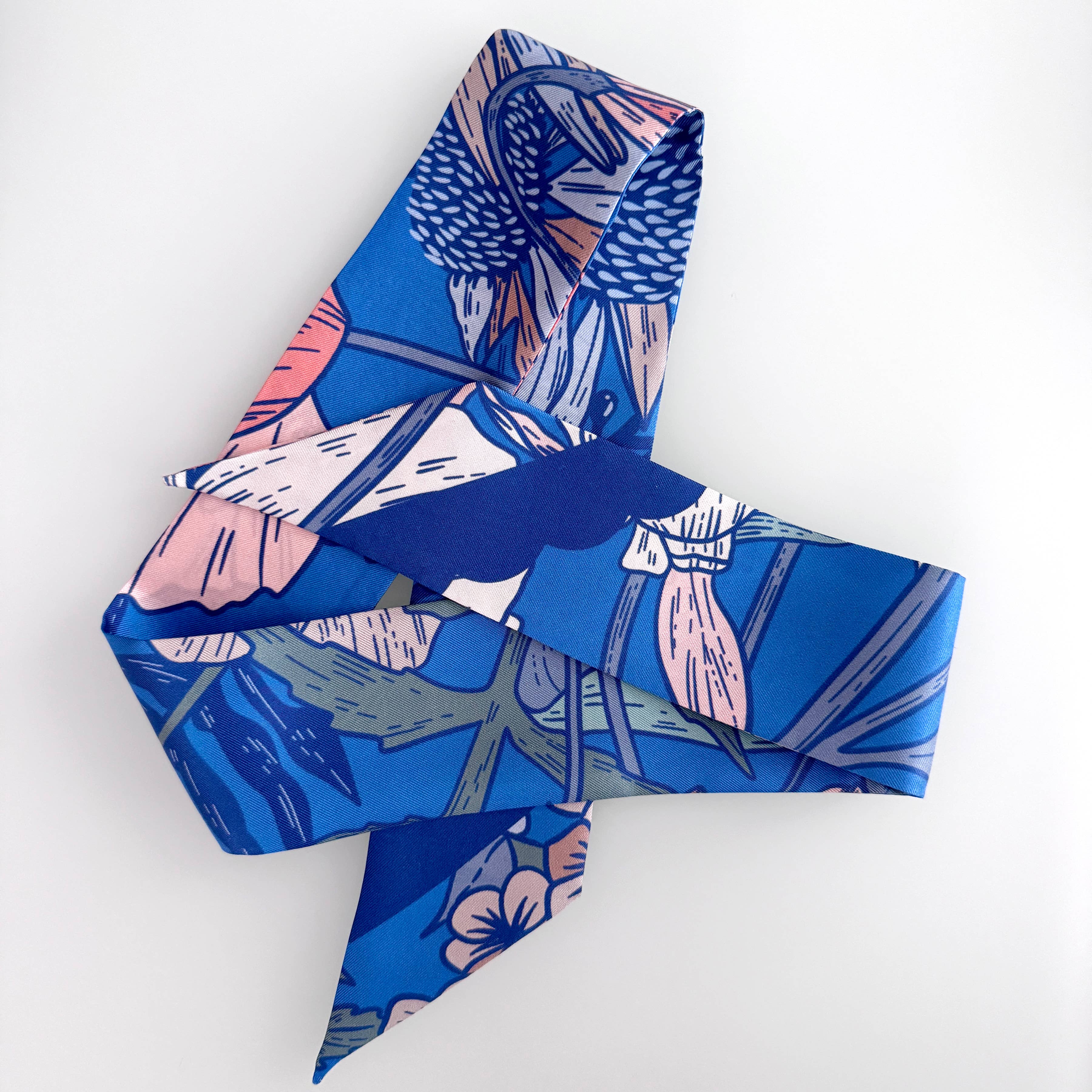 Blue floral patterned fabric on a white background