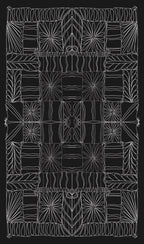 Black and white geometric patterned rug with intricate designs on a dark background