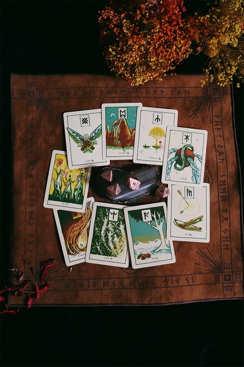 Set of tarot cards on a leather surface with decorative elements