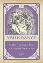 Card with illustration of two people with a harvest, titled 'Abundance' on a purple background.