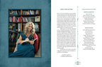 Woman in a blue dress reading a book in a room filled with books, with text on the right side.
