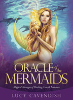 Book cover of 'Oracle of the Mermaids' with a mermaid and dolphins underwater.