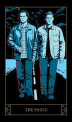 Two men in matching outfits with a tarot card design labeled 'The Fools'.
