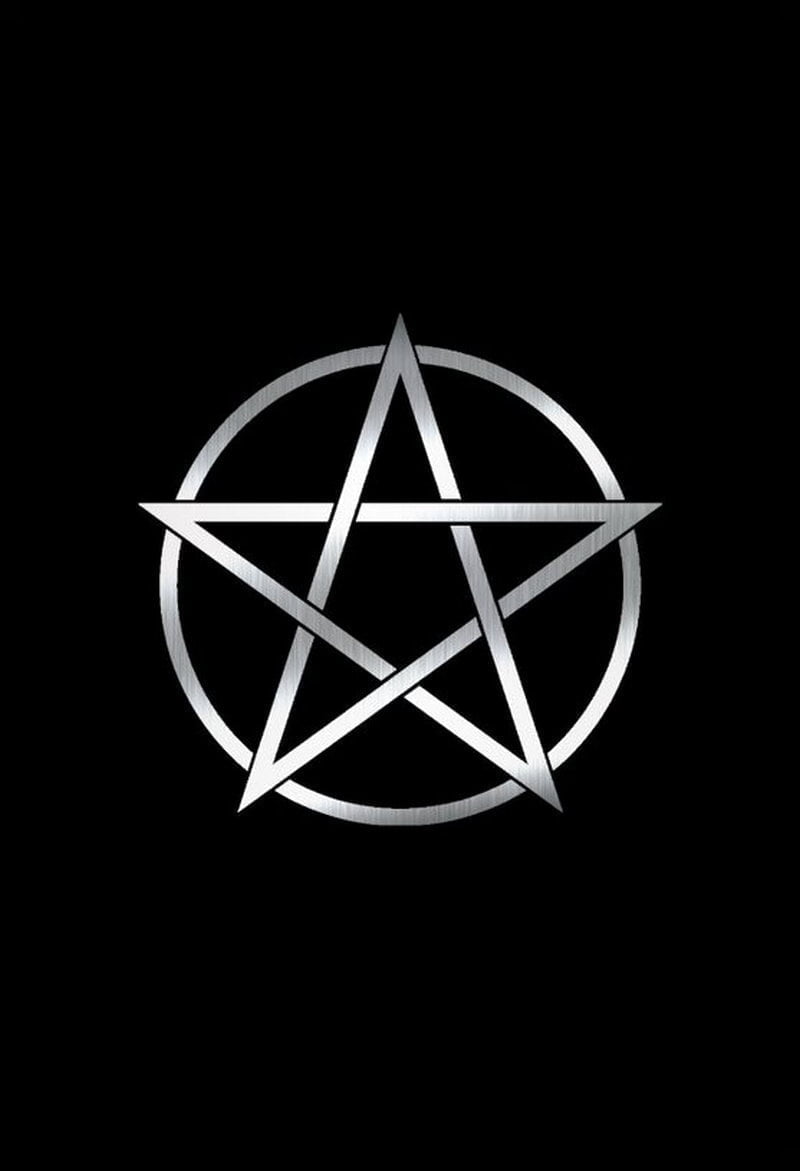 Silver pentagram symbol on a black background